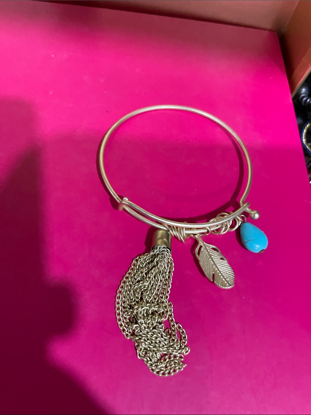 Gold Tone Feather Charm Bangle Bracelet with Turquoise Stone